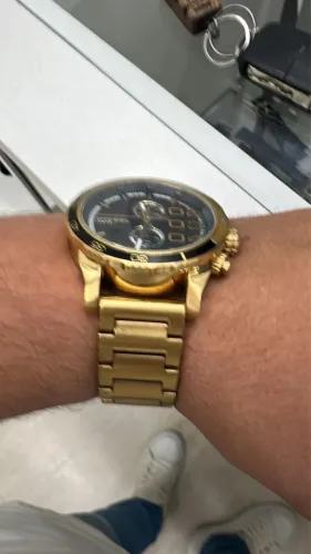Relógio Disel dourado