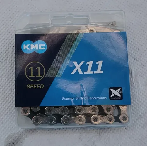 Corrente KMC X11, 11 velocidades, 118 elos, 1/2" x 11/128", prata/preta, com Missing Link.