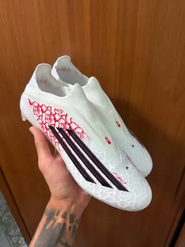 Chuteira adidas f50