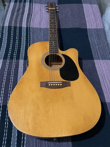 Vendo Violão Memphis de aço em bom estado