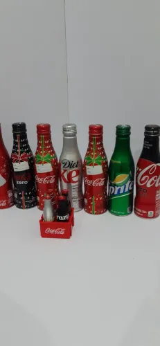Garrafas colecionaveis coca cola +mini engradado. 