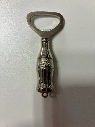 Abridor metal cromado COCA COLA