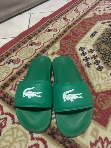 chinelo slide lacoste
