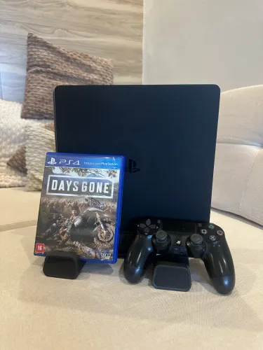 PS4 Slim - 500gb - jogos + base vertical que resfria muito novo e conservado!!