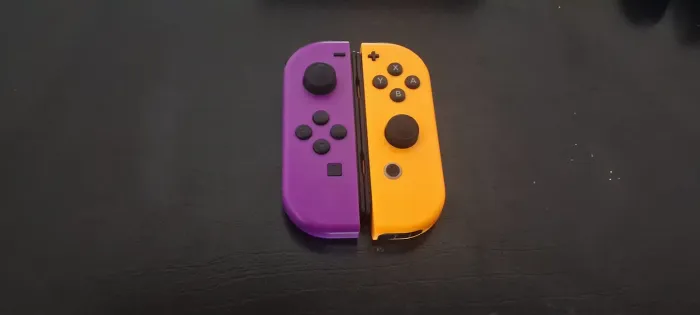 Controles Joy cons Roxo e Laranja(usados)