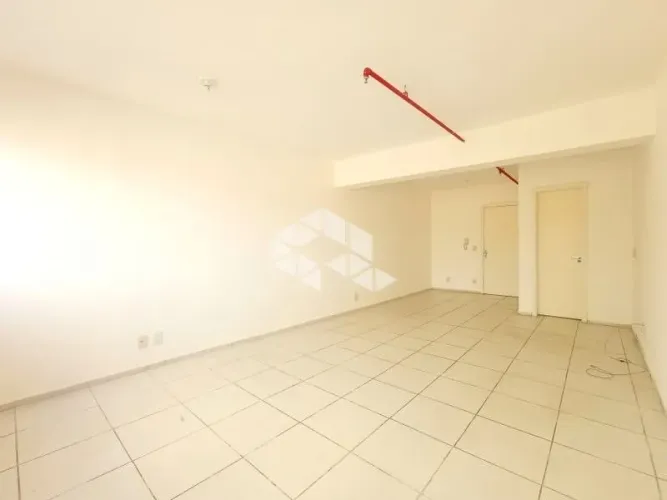 Sala - conjunto comercial com vaga de garagem à venda no bairro Partenon em Porto Alegre.