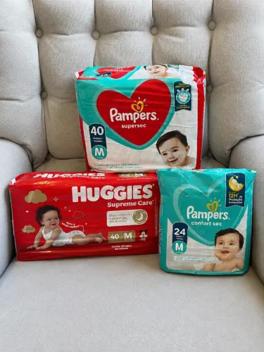 KIT FRALDAS PAMPERS E HUGGIES