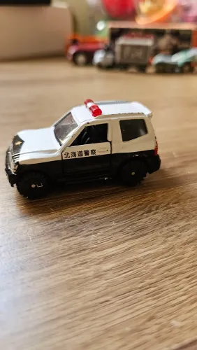 Miniatura Tomica carro de polícia