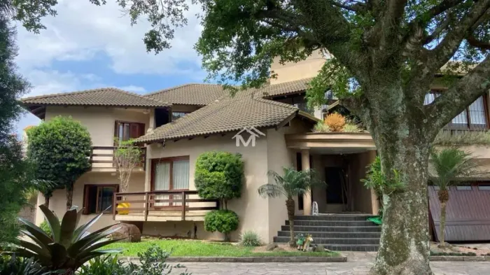 Aluguel de Sobrado em Canoas - Casa com Piscina e Churrasqueira no Bairro Igara REF: 50153