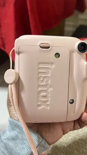 Máquina fotográfica instantânea instax