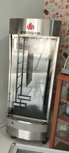 Vende se máquina de assar frango