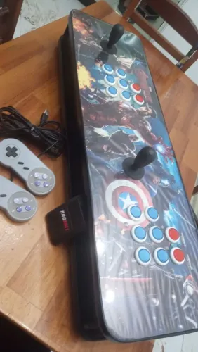 Console super Nintendo com mais de 1000 jogos . Dois controles com extensor de cabo .