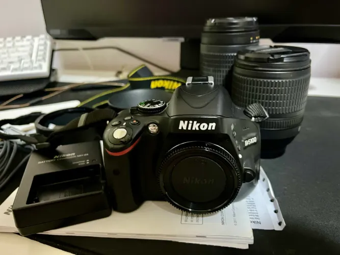 Nikon D5100 + 2 lentes originais + acessórios ? bateria sem carga