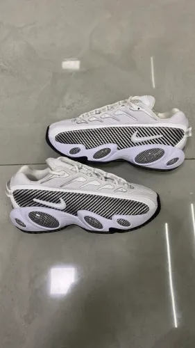 NOCTA x Nike Glide White Black University Gold