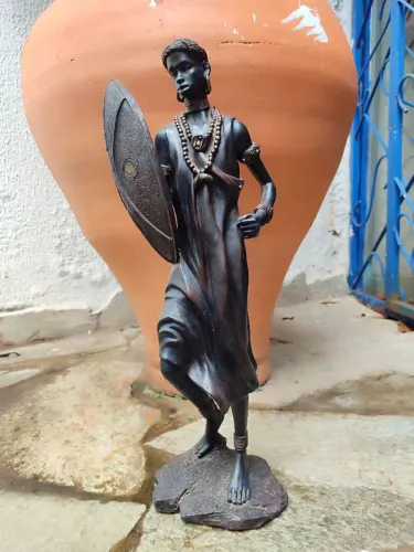 Escultura guerreiro africano
