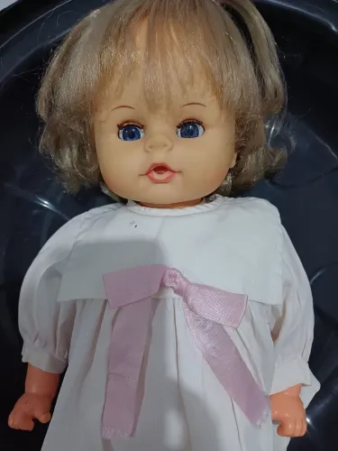 Boneca bochechinha da estrela antiga,  não funciona,  desfazendo minha coleção. 
