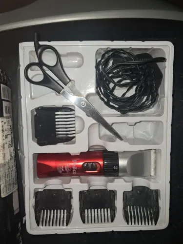 Máquina de Cortar Cabelo Philco Skull Pro Vermelha / Bivolt + Acessórios