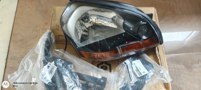 Farol Tucson (original Novo) somente carona