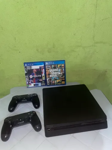 Ps4 1tb,2 manetes,2 jogos físicos e 15 digitais