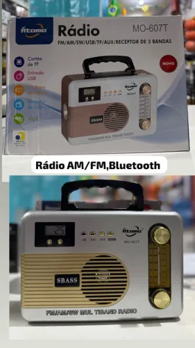 rádio portátil da marca Atomo, modelo MO-607T, com estilo retrô e acabamento prateado.
