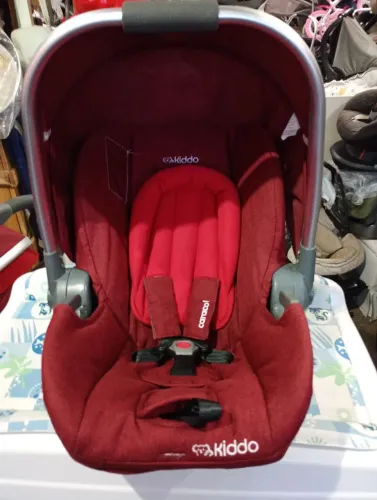 Bebê conforto kidoo pra automóveis 
