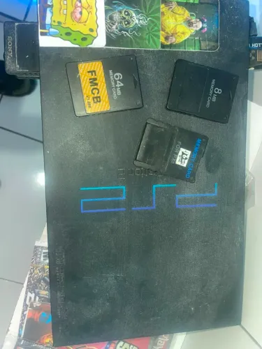 Playstation 2 10 jogos e 2 controles.