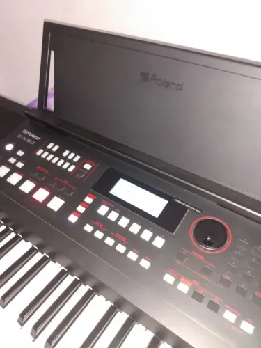 Vendo teclado Roland ex50 valor 2,500