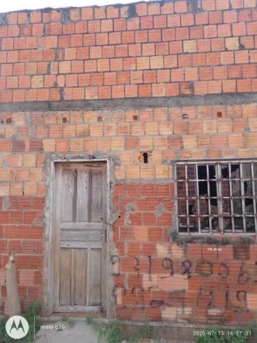 Vendo terreno com uma casa construída 