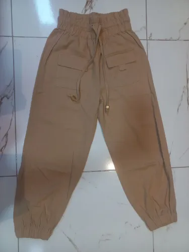 Calça bege Riachuelo