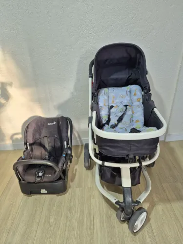 Carrinho Safety com bebe conforto 