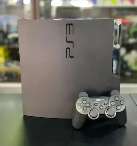Playstation 3 Slim 160GB Usado<br><br>Controle sem fio Ps3 Preto/01 Jogo Ps3<br><br>mídia física