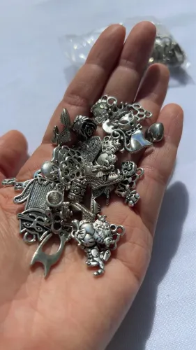Peças diversas em metal prateado para artesanato