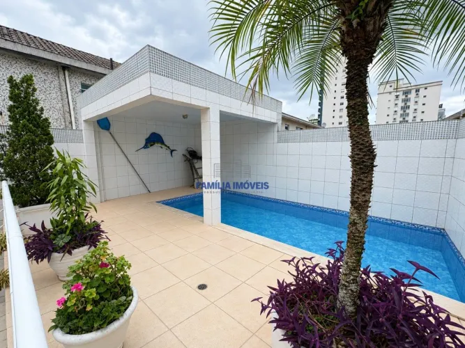 Vender ou alugar sobrado 4 suítes piscina Aparecida Santos SP