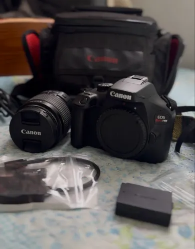 Canon T100