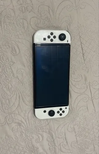 Vendo Nintendo switch oled com vários acessórios
