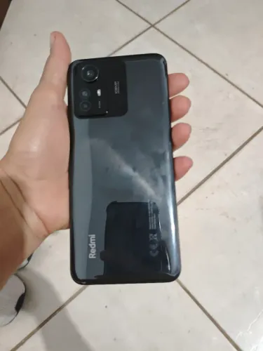 Vendo celular semi novo 