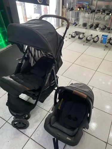 Conjunto de bebê carrinho e bebê conforto