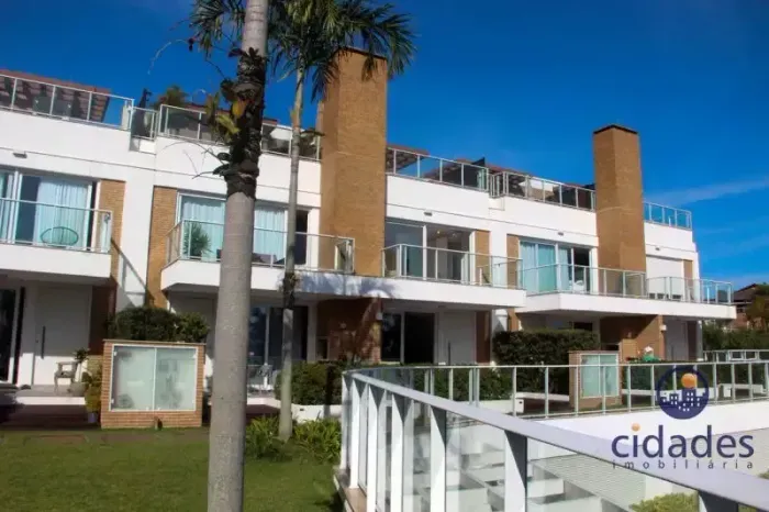 Aluguel de casa em condomínio 4 quartos suíte, semimobiliada, 3 vagas de garagem, Cacupé,