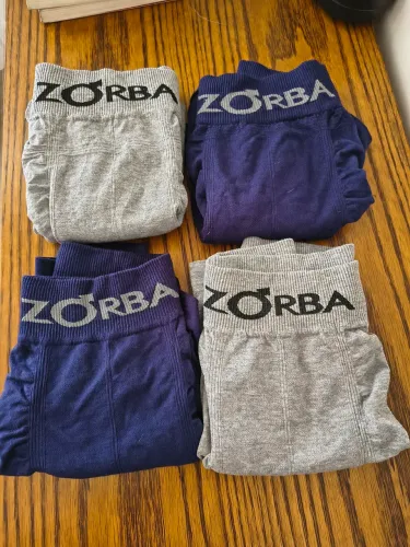 8 cuecas tamanho GG 4 azul escura e 4 cinza