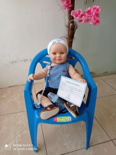Bebê rebom Matheus vai com certidão de nascimento,chupeta, mamadeira,