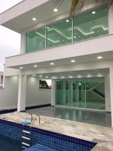 Sobrado condomínio fechado com 5 dormitórios à venda, 422 m² por R$ 2.850.000 - Centro - B