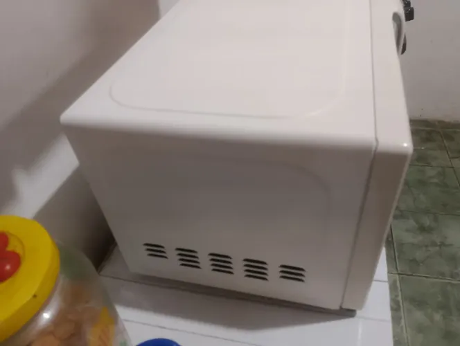 Microondas Midea espelhado 20 litros funcionado perfeitamente . 