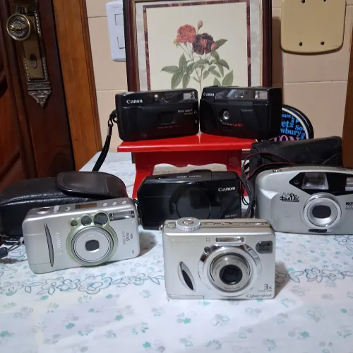 Câmeras   1SONY, 4 CANON, 1  DEPLÁ, 2 capas 