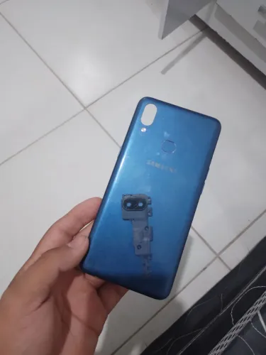 Tampa traseira do Galaxy A10s Funciona a impressão digital ele vai com a lente da câmera