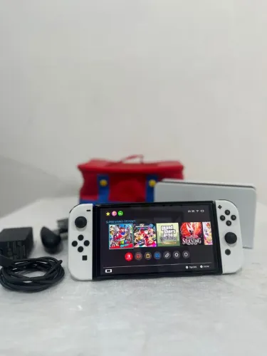 NINTENDO SWITCH OLED 64GB + 256 EXTRA
