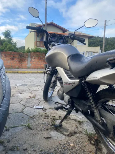 Titan 150. Troco por biz