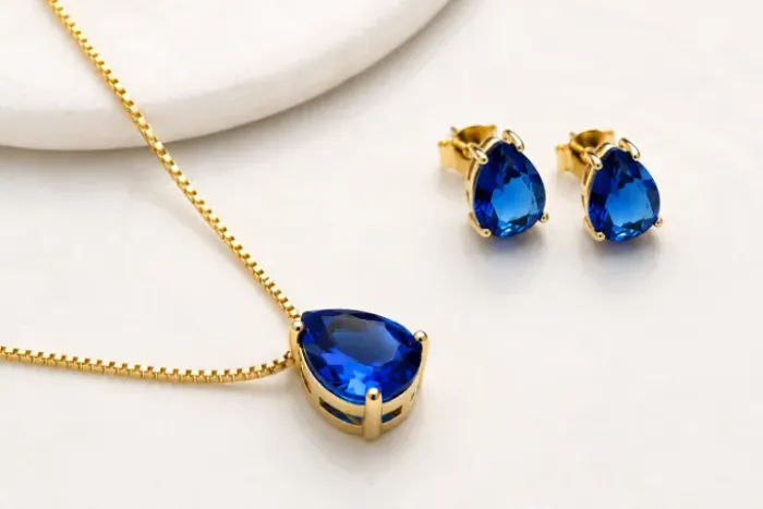 Conjunto gota azul safira banhado a ouro