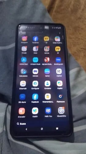 Celular novo com película troco em uma motinha que ande