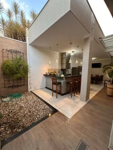 Casa com 3 dormitórios para alugar, 140 m² por R$ 5.000,00/mês - Condomínio Santa Mônica I