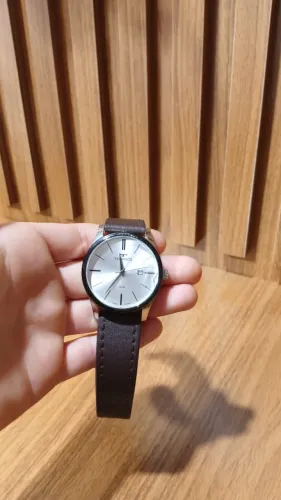 Relógio Technos original masculino com pulseira de couro marrom.